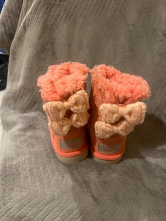 Girls pink suede UGG boots